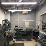 Industrial workspace lit by 4ft LED Tube 17W Type B fixtures providing bright energy-efficient lighting above machinery
