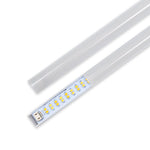 Frosted lens covers for 2x2 Color & Wattage Selectable Retrofit Kit with LED strip partially covered for diffuse lighting.