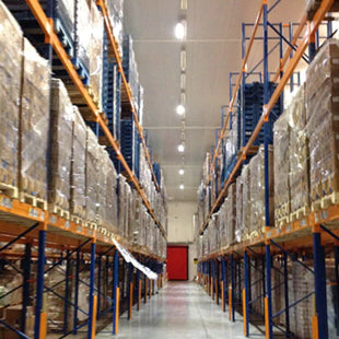 Cold storage warehouse with aging HID high bay lighting ready for LED retrofit upgrade to improve efficiency and visibility