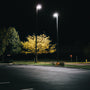 LED Shoebox Area Light 3 CCT illuminating a parking lot with bright, clear white light at night.