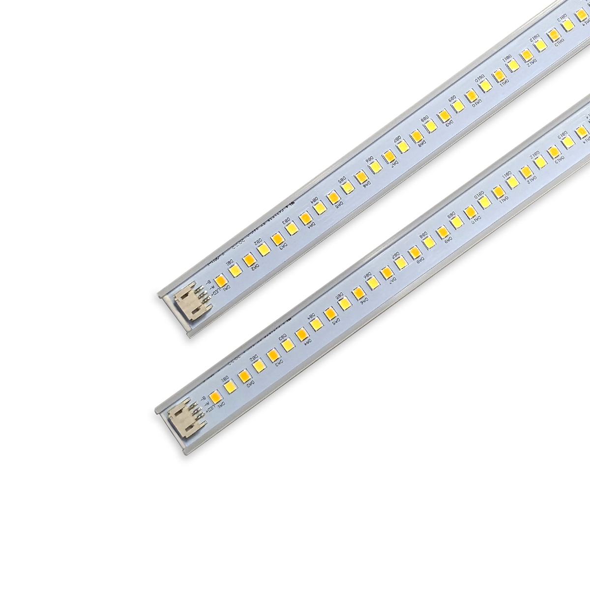 Close-up of two LED magnetic retrofit light strips for 2x4 or 1x4 troffers with quick-connect plug ends.